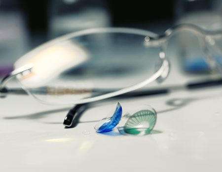glasses, colored contact lenses, vision concept